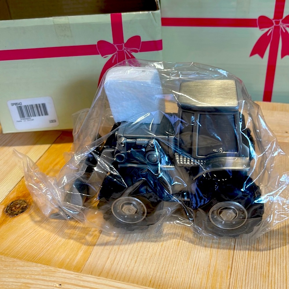 Brand new pewter bulldozer bank for kids. Still in original box.